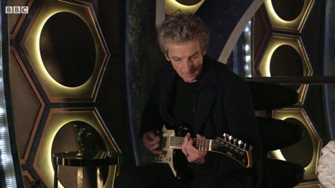 Twelfth Doctor with guitar